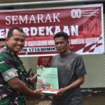 Dandim 1710 Mimika Serahkan Hadiah Lomba HUT RI ke-80